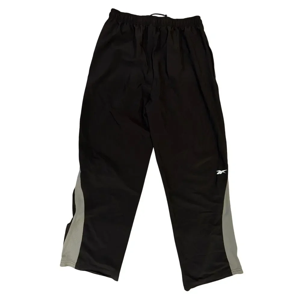 Vintage Reebok Y2K black wind pants men’s medium elastic waist retro athletic